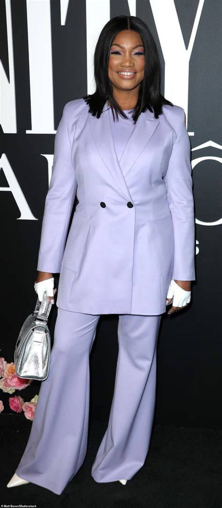 Spring-ready:&nbsp;Garcelle Beauvais looked spring-ready in a lavender blazer and matching flared trousers
